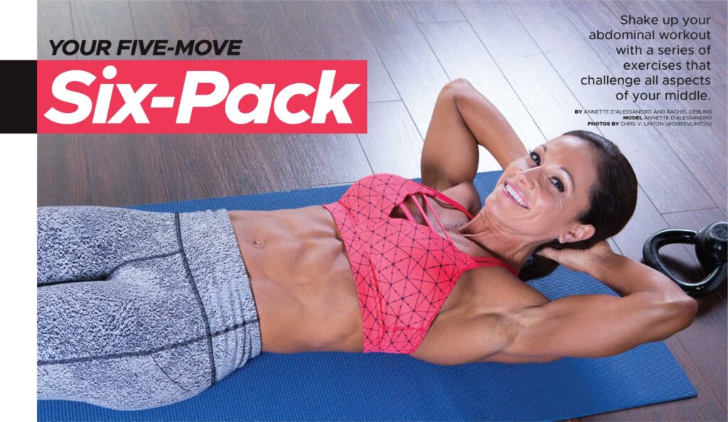 Woman performing an abdominal crunch on a blue exercise mat.