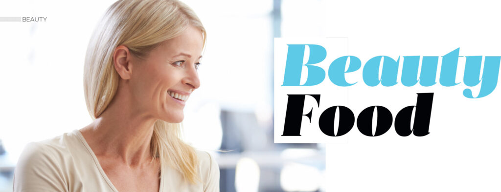 Smiling blonde woman beside the heading Beauty Food.