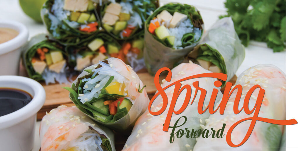 Fresh vegetable rolls and dipping sauce beneath the heading Spring Forward.