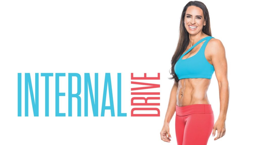 Fit woman in a blue sports bra and red leggings smiling, standing next to the words INTERNAL DRIVE in blue and red text on a white background.